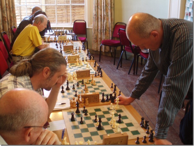A simul with IM Andrew Martin Club members playing a simultaneous display against IM Andrew Martin at a Trowbridge Chess Club weekend event